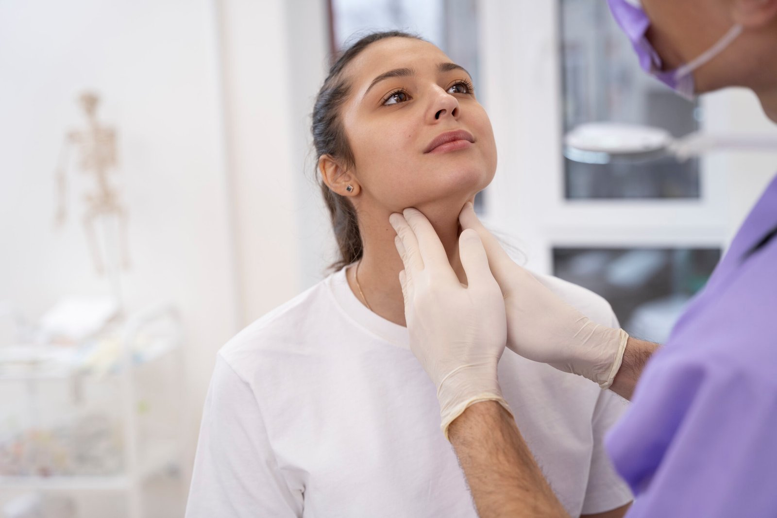 doctor-performing-routine-medical-checkup